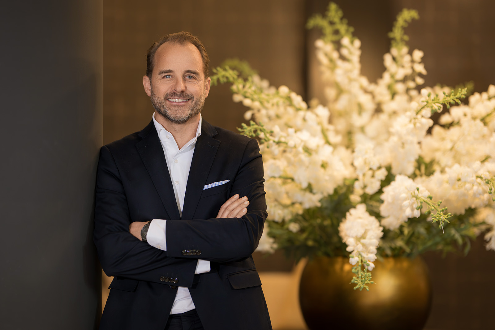 Executive portrait of a business leader in an elegant corporate interior